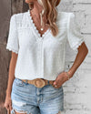 Women's Bohemian Lace Trim Blouse with Swiss Dot Texture and V-Neckline in White | Invictora.com